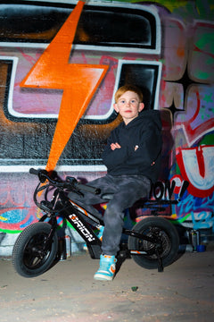 A kid on the Orion e16x at the wall